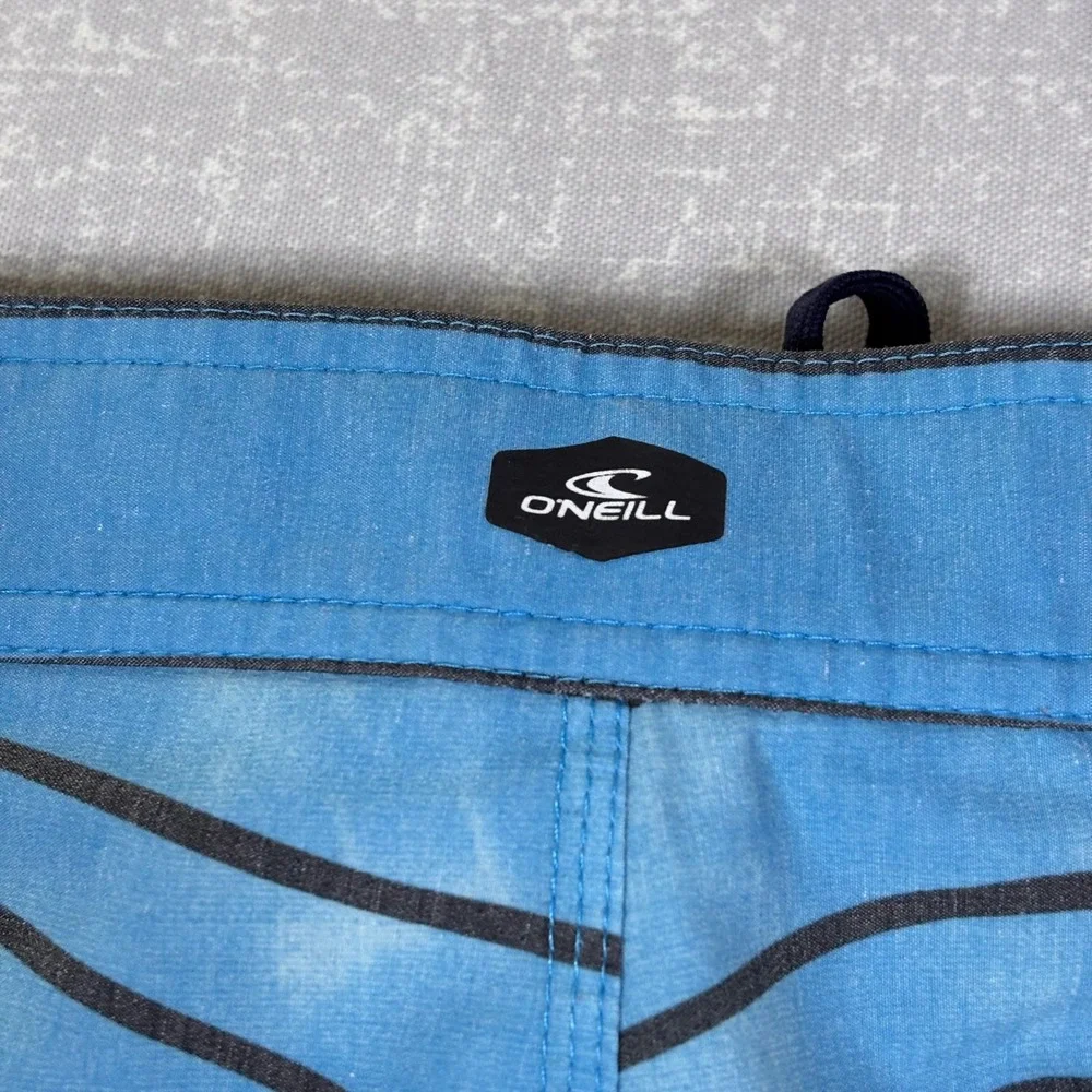Lot of 2 O'Neill Mens Board Shorts Size 30 Blue Floral & Red Striped Swim Trunks